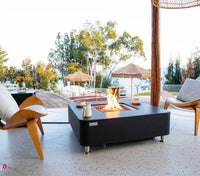 Copenhagen Fire Table, Glass-fibre reinforced concrete with Marble porcelain top