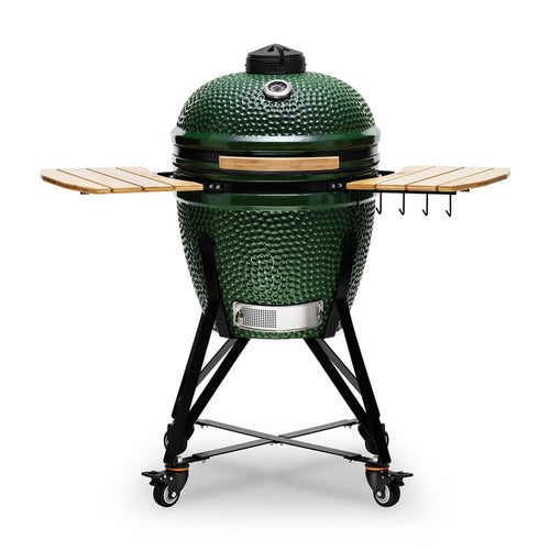 Green ceramic grill with wooden shelves on a white background