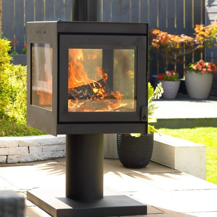 Modern outdoor fireplace with flames on a patio