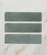 Reform Composite Stone Tumbled Leaf Green 6x25cm Sample