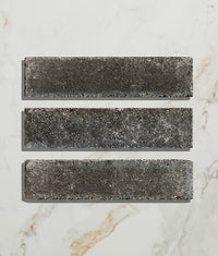 Reform Composite Stone Tumbled Nero 25x25cm Sample