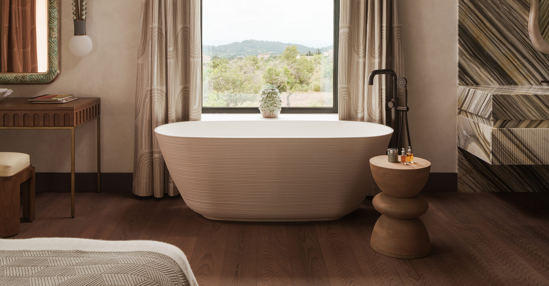 Warm contemporary bathroom featuring Samuel Heath fittings and a freestanding bath